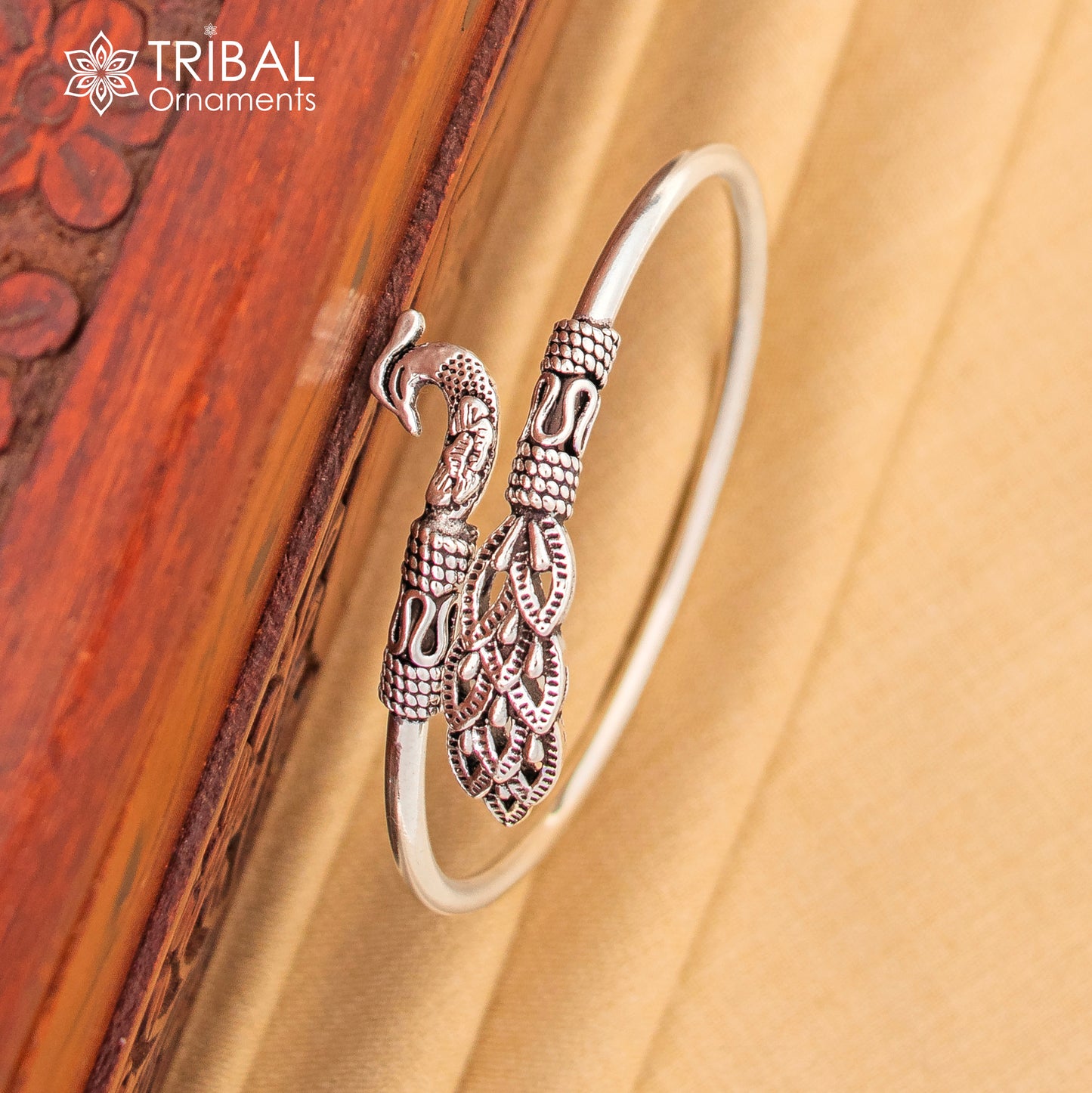 Peacock style 925 sterling silver bangle bracelet by Tribal Ornaments, easy to wear silver kada jewelry on the wrist.