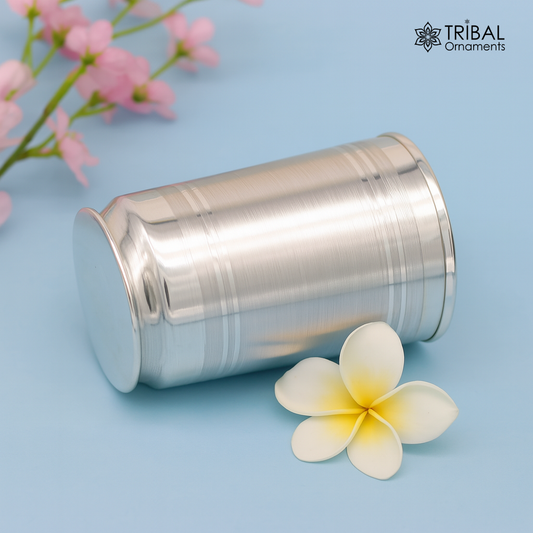 Pure 999 fine silver handmade water and milk glass tumbler, silver flask, and kids silver utensils by TRIBAL ORNAMENTS.
