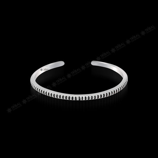 Handmade 925 sterling silver adjustable cuff bangle bracelet from TRIBAL ORNAMENTS, unisex jewelry with intricate tribal design.