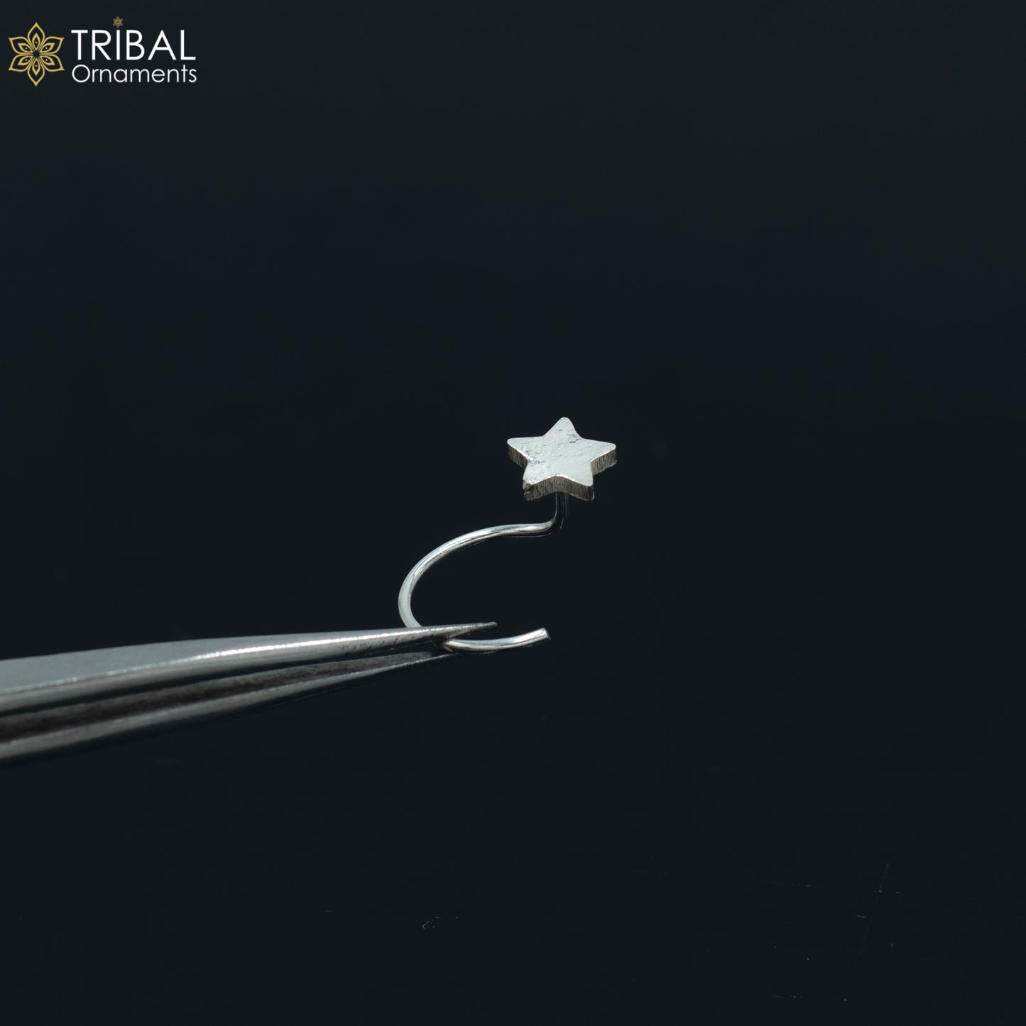 Sterling silver star design nose pin by Tribal Ornaments, U-band tribal jewelry nose pin with intricate star pattern.