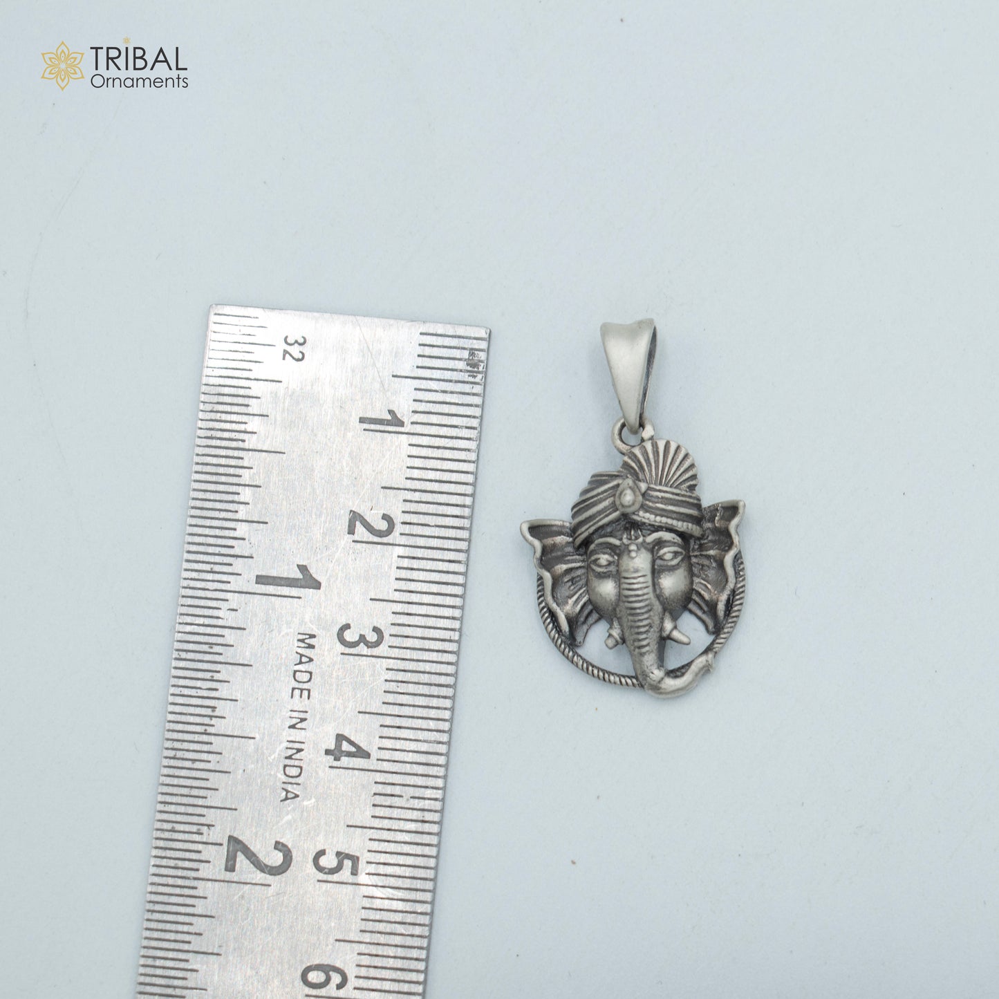 Handmade 925 sterling silver Lord Ganesha pendant with chain from Tribal Ornaments, featuring tribal jewelry design.