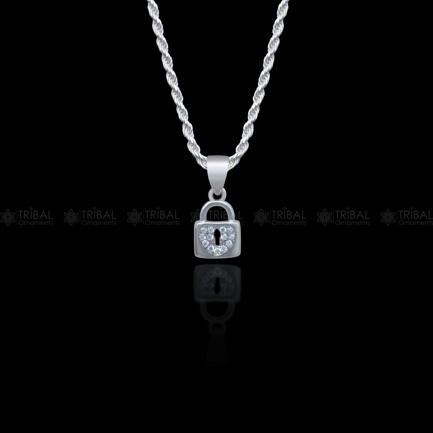 Sterling silver pendant with a lock shape featuring diamond cubic zirconia stones by Tribal Ornaments.