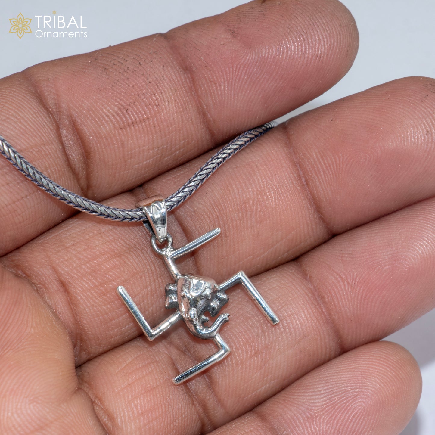 925 sterling silver Swastik and Ganesha pendant with chain, tribal jewelry featuring intricate tribal ornament design.