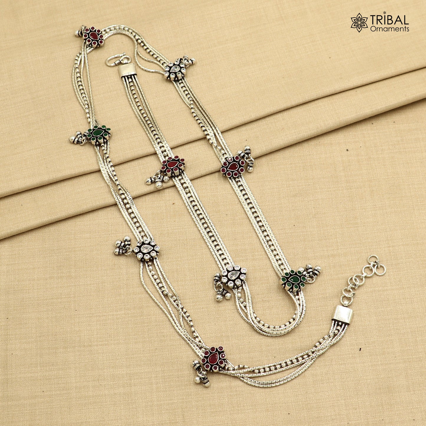 Sterling silver adjustable belly chain with vintage multiline design and red stones, featuring traditional tribal ornament style.