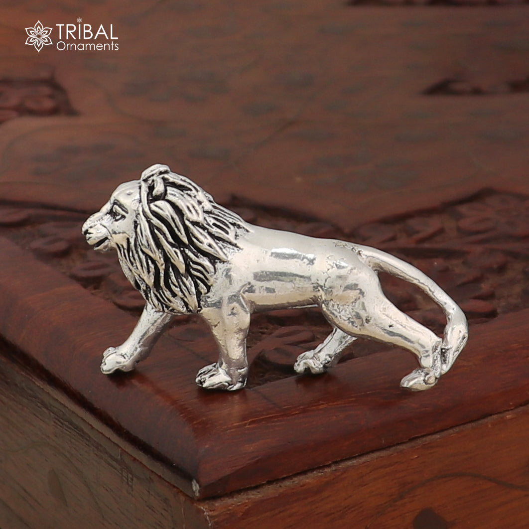 Sterling silver vintage baby lion sculpture by TRIBAL ORNAMENTS, detailed puja art statue for home decor.