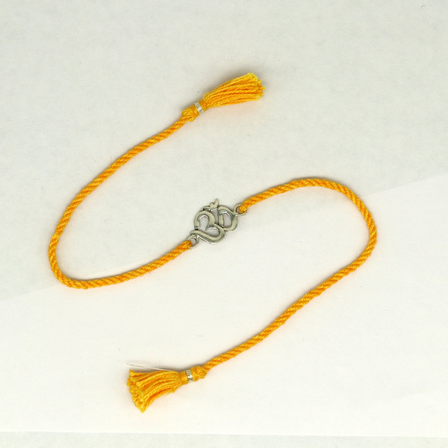 925 sterling silver custom design OM / AUM design Rakhi bracelet with stunning yellow thread Best sibling rakhi for Festival Rakshabandhan rk160 - TRIBAL ORNAMENTS