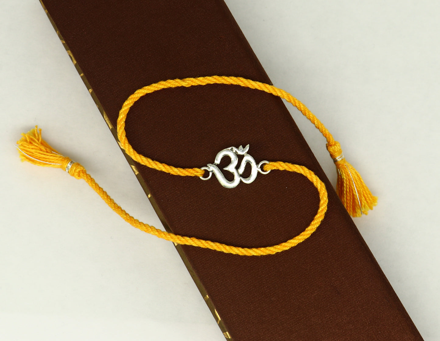 925 sterling silver custom design OM / AUM design Rakhi bracelet with stunning yellow thread Best sibling rakhi for Festival Rakshabandhan rk160 - TRIBAL ORNAMENTS