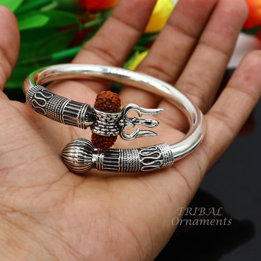 Sterling silver Lord Shiva Trishul bangle bracelet with natural Rudraksha beads and shiny finish, handcrafted by Tribal Ornaments.