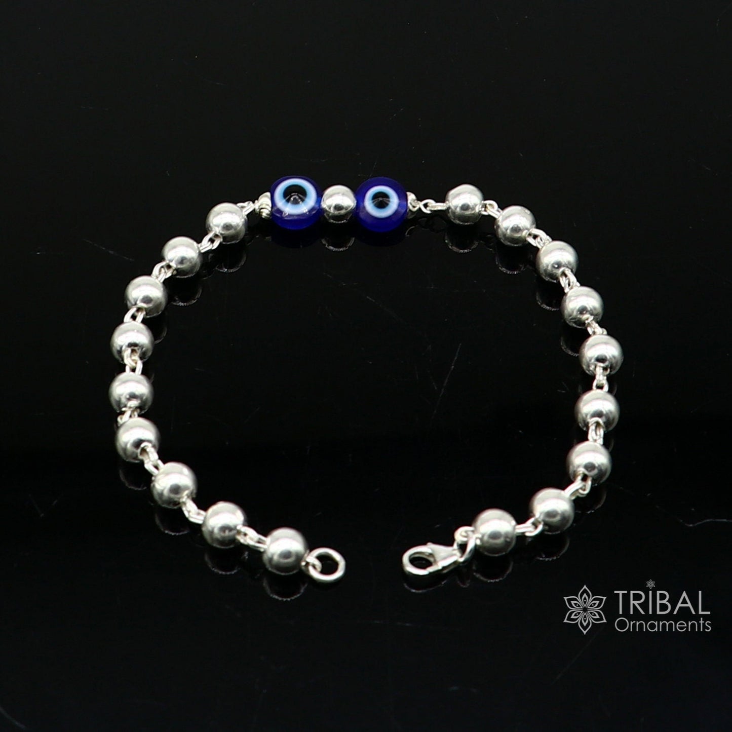 Sterling silver handmade evil eye bracelet with beaded design, unisex cultural jewelry, all sizes, stylish and trendy.