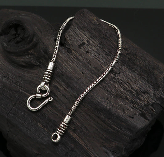 Sterling silver handmade wheat chain bracelet by TRIBAL ORNAMENTS, showcasing an elegant and stylish silver jewelry design.