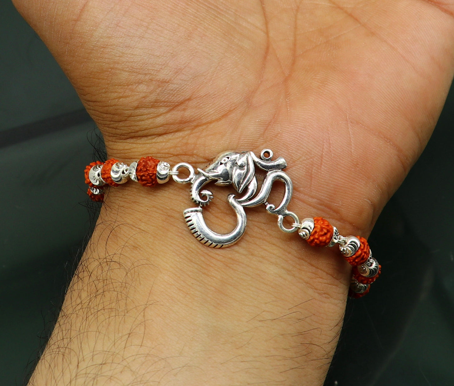 925 Sterling silver OM Rudraksha bead bracelet with customizable Aum design by TRIBAL ORNAMENTS.