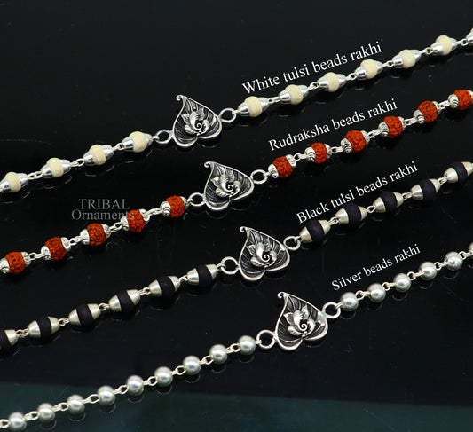 Sterling silver Lord Ganesha on Paan design Rudraksha and Tulsi bead bracelet with handmade craftsmanship and intricate details.