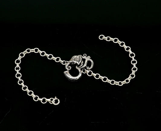 925 sterling silver Ganesha design bracelet by TRIBAL ORNAMENTS, handmade with OM symbols, 7-inch size and intricate details.