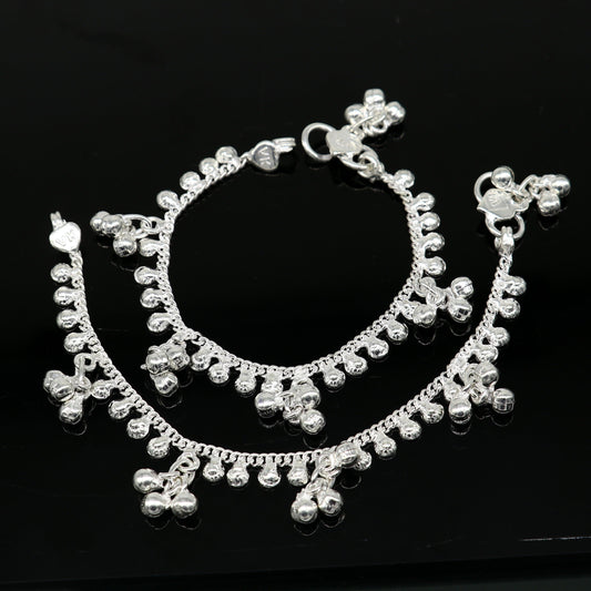Handmade 5.5-inch sterling silver baby anklet with unisex design and customized charm, featuring intricate tribal ornament details.