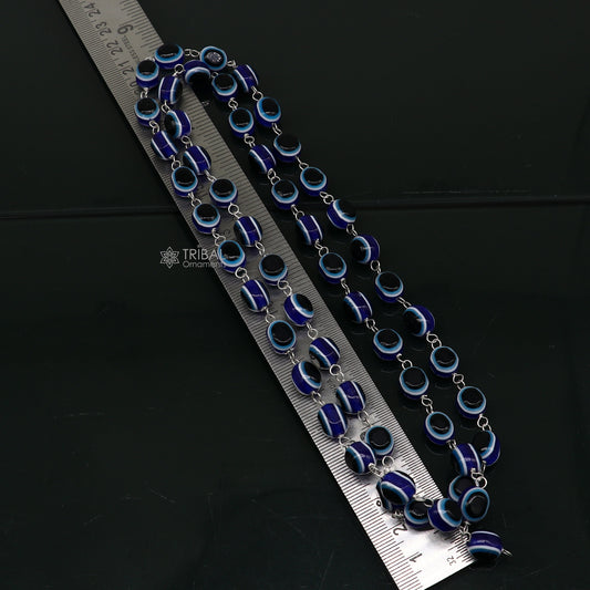 Handmade 54-bead Jaap mala necklace with evil eye beads and 925 silver chain, ideal for meditation and spiritual practice.