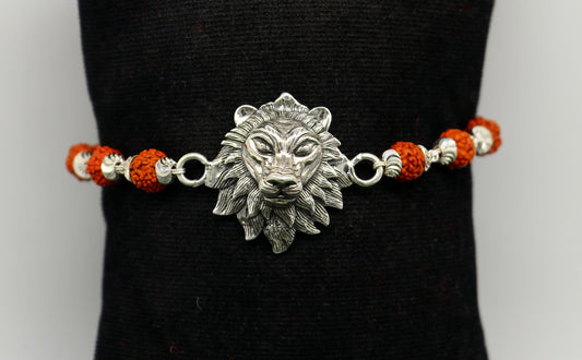 Sterling silver lion design Rudraksha beaded bracelet with personalized customization from Tribal Ornaments.