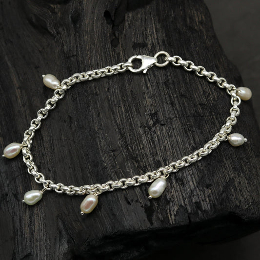 925 sterling silver customized charm pearl bracelet by TRIBAL ORNAMENTS, featuring handmade unisex jewelry with stylish pearls and unique charms.