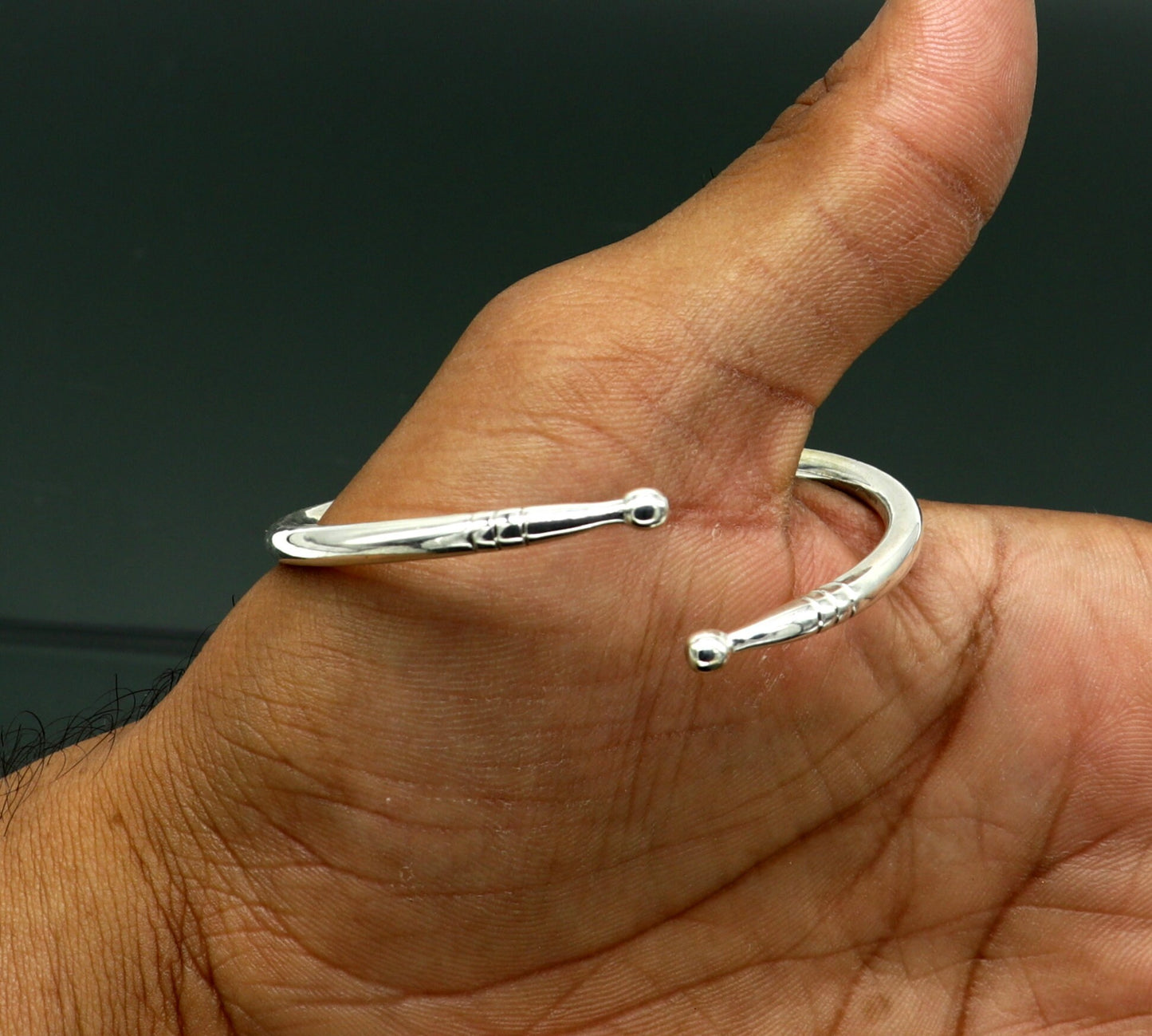 925 sterling silver baby bangle by TRIBAL ORNAMENTS featuring a plain bright design, adjustable newborn baby bracelet, ideal for gifting.