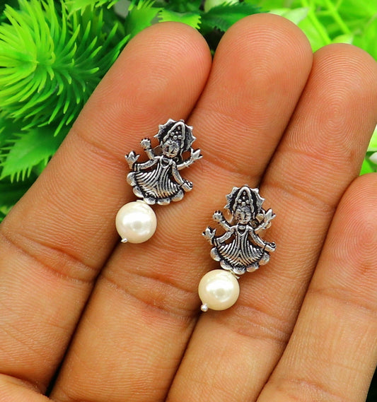 Sterling silver tribal deity goddess stud earring with dangling mother of pearl, handcrafted by Tribal Ornaments.