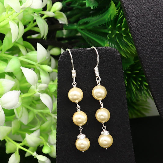 Sterling silver handmade hoop earrings with dangling pearls, designed for bridesmaids, featuring a custom hook and elegant drop style.