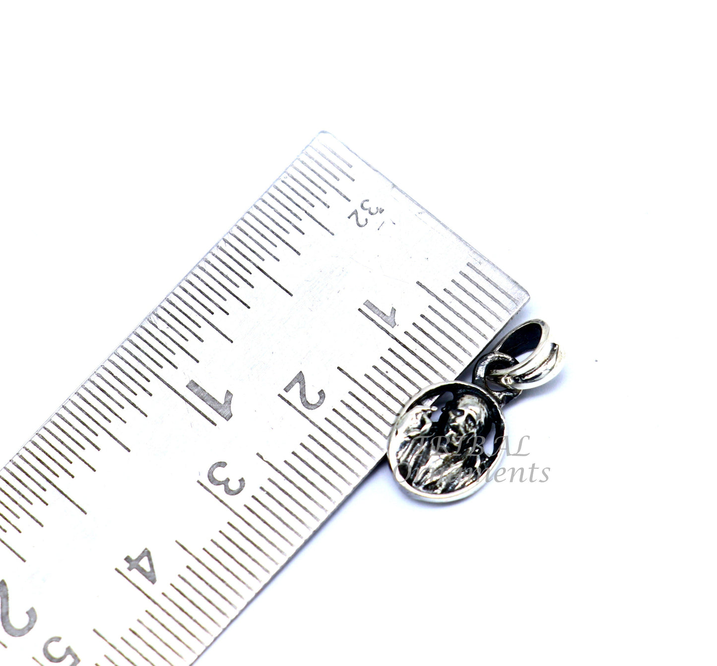 925 sterling silver Sai Baba pendant, handmade unisex jewelry featuring detailed idol design by TRIBAL ORNAMENTS.