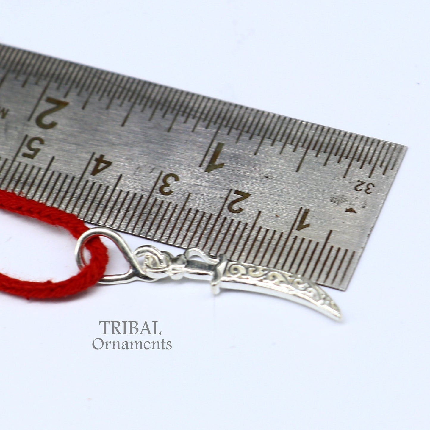 925 sterling silver tiny sword pendant by TRIBAL ORNAMENTS, handmade talwat knife design for protection against negative energy.