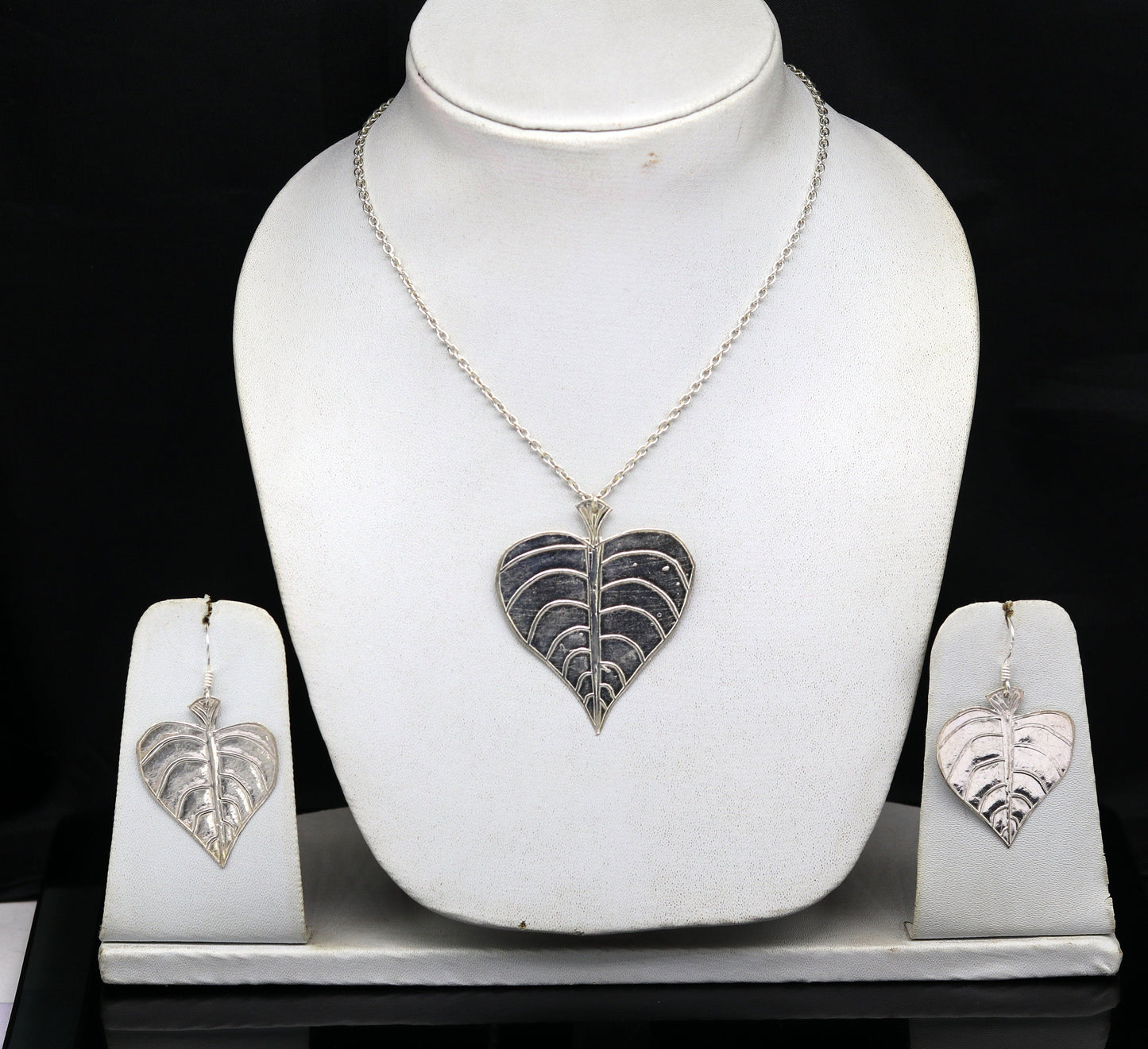 Sterling silver heart-shaped peepal tree leaves pendant necklace with matching hoops earrings, handcrafted tribal jewelry for brides.