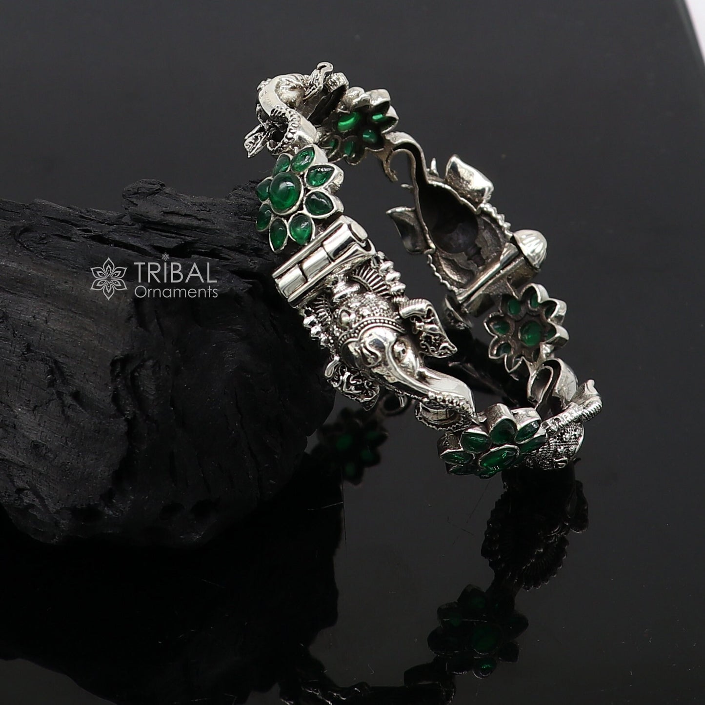 Sterling silver Ganesha design bangle bracelet with floral style green stone, ethnic jewelry by TRIBAL ORNAMENTS.
