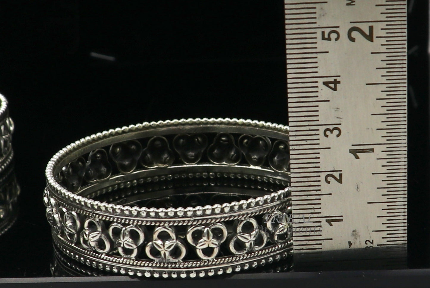 925 sterling silver flower design bangle bracelet by TRIBAL ORNAMENTS, showcasing intricate tribal and ethnic jewelry craftsmanship.