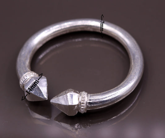Bright handmade solid silver open face adjustable bangle cuff bracelet from TRIBAL ORNAMENTS, unisex tribal jewelry design.