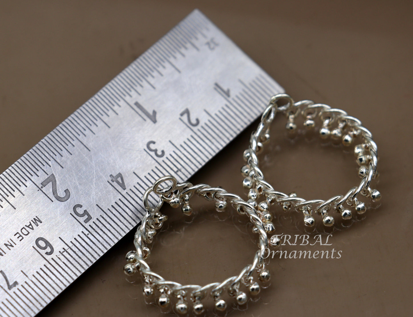 Small size Lord Krishna anklet by TRIBAL ORNAMENTS, featuring intricate Laddu Gopala design on traditional Krishna ankle bracelet.