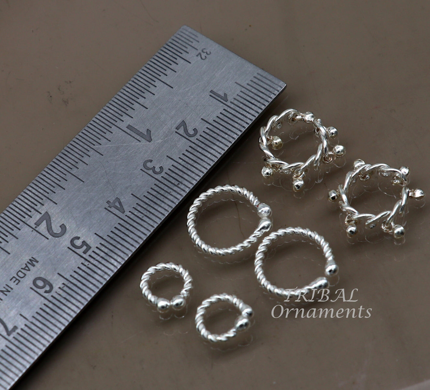 Baby Krishna jewelry set with cuff Kada, ankle Kada, and anklet featuring Lord Gopala design by TRIBAL ORNAMENTS.