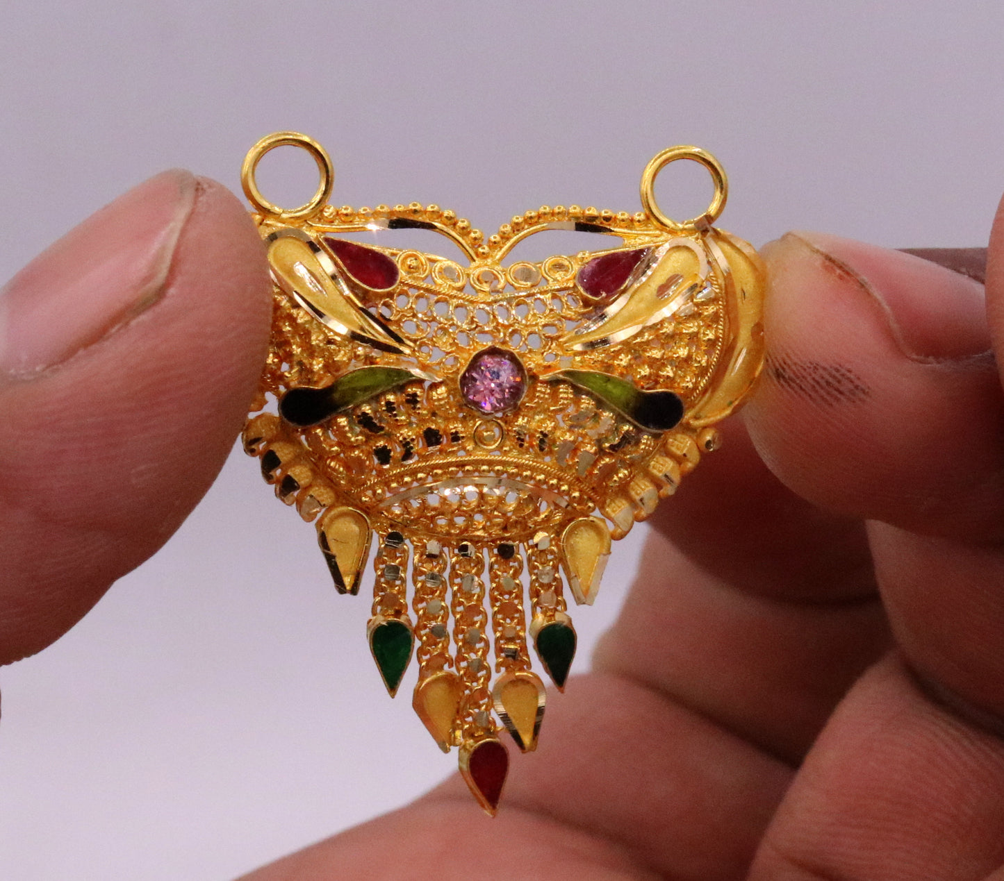 Handcrafted 22KT yellow gold tribal pendant with intricate filigree work, hallmarked solid gold jewelry from TRIBAL ORNAMENTS.