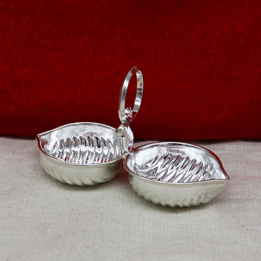 Sterling silver leaf design tilak combo mini bowl and tilak patra for puja, handcrafted by Tribal Ornaments, traditional temple utensils.