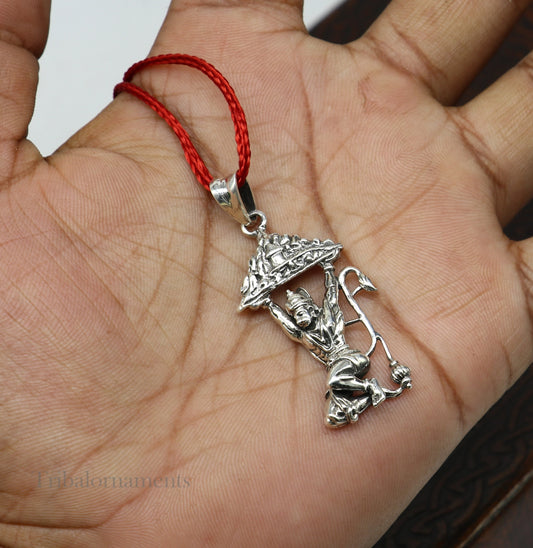 Sterling silver Hanuman ji pendant by TRIBAL ORNAMENTS, handcrafted divine jewelry with detailed craftsmanship, ideal for gifting.