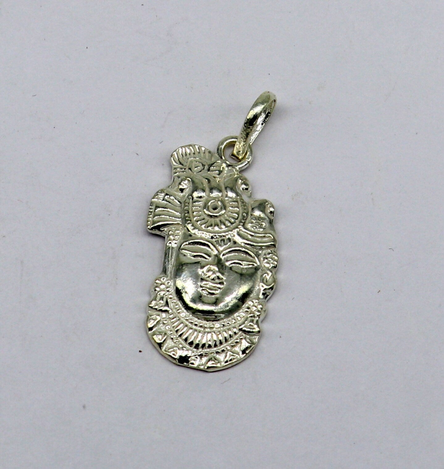 Solid sterling silver Lord Krishna Shrinathji tiny pendant, handmade unisex Hindu jewelry by TRIBAL ORNAMENTS.