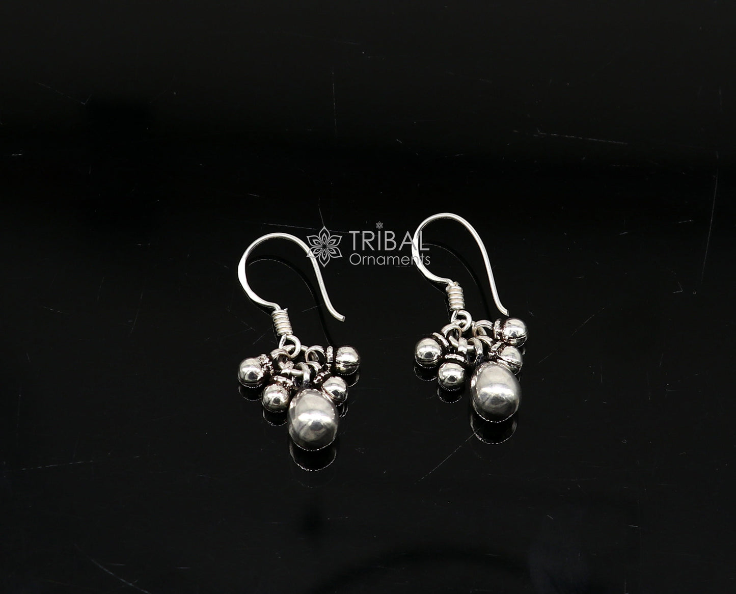 Traditional tribal-inspired 925 sterling silver hoop earrings with dangling drops, customized and trendy tribal jewelry by TRIBAL ORNAMENTS.
