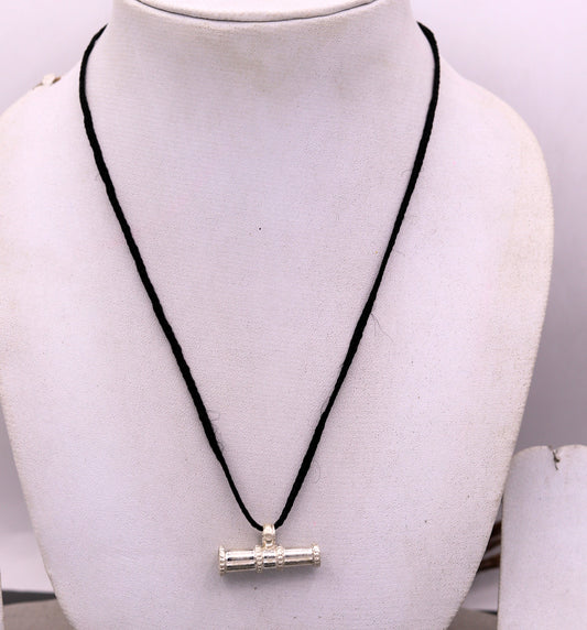 Traditional tribal-style sterling silver pendant from Rajasthan, unisex jewelry with antique design by TRIBAL ORNAMENTS.