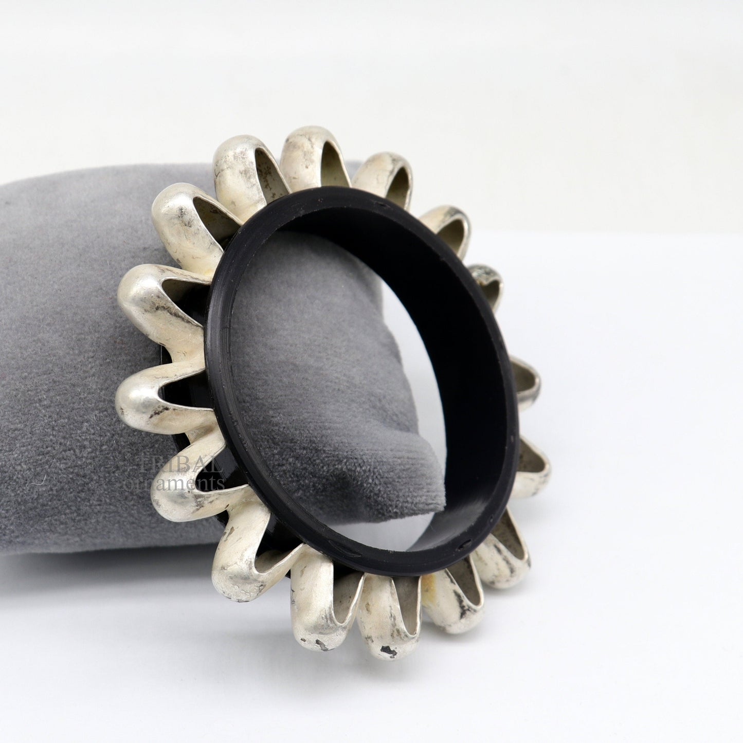 Vintage silver tribal bangle from TRIBAL ORNAMENTS, featuring intricate handmade ethnic Banjara jewelry design.