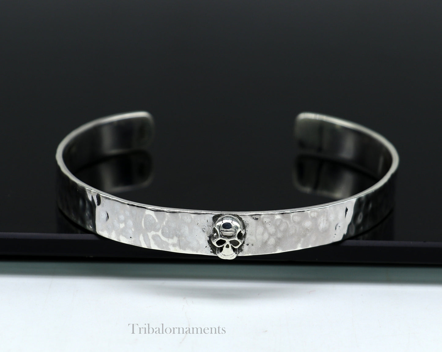 Vintage-style 925 sterling silver adjustable cuff bracelet by Tribal Ornaments, featuring a solid skull design, unisex jewelry.