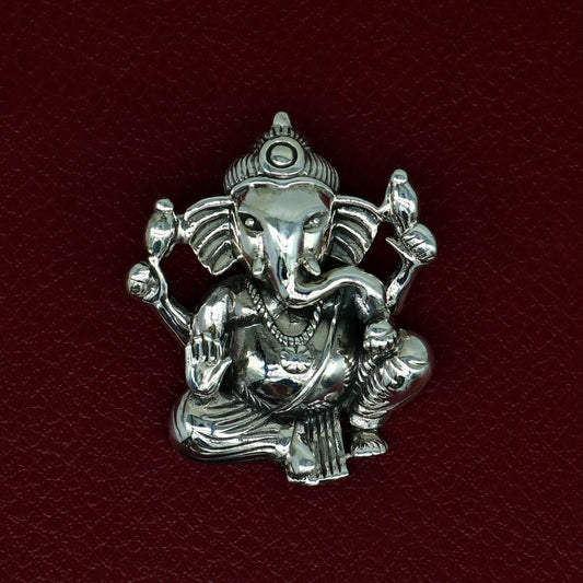 Sterling silver Lord Ganesha pendant by TRIBAL ORNAMENTS, handmade unisex jewelry with intricate design and personalized style.