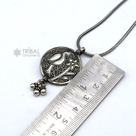 Sterling silver handmade peacock pendant with hanging drops, traditional Indian tribal jewelry by TRIBAL ORNAMENTS.