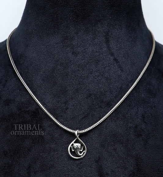Sterling silver Lord Ganesha pendant by TRIBAL ORNAMENTS, handmade unisex jewelry with intricate divine design.