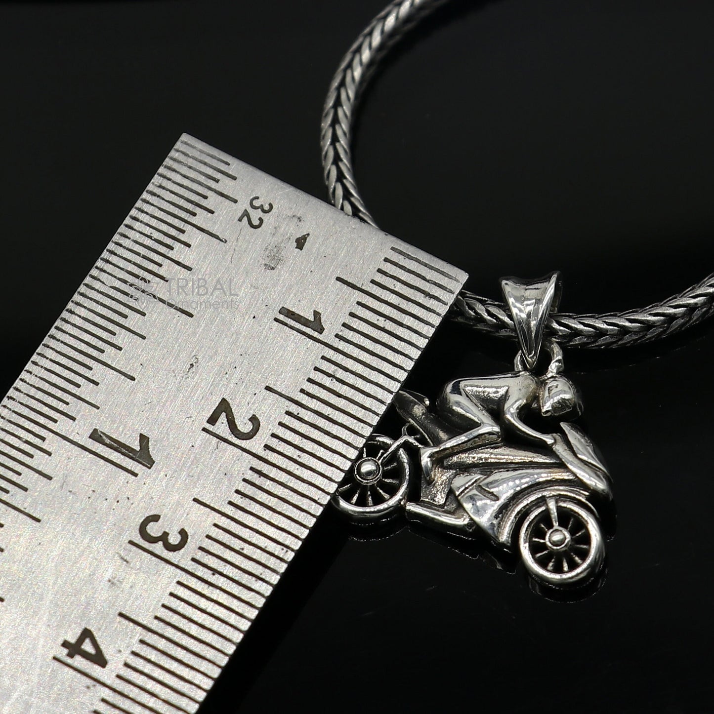 Sterling silver bike pendant by Tribal Ornaments, stylish unisex jewelry for bike lovers, detailed motorcycle design.