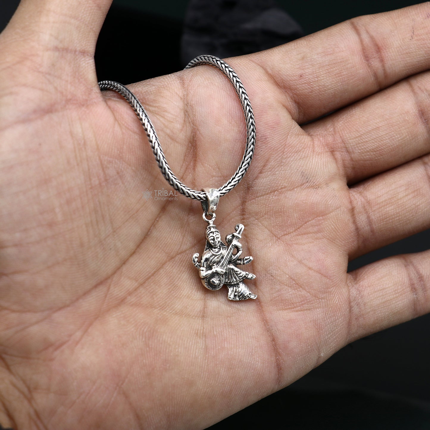 Sterling silver Saraswati Maa pendant by Tribal Ornaments, handcrafted goddess jewelry for students and spiritual prayer.