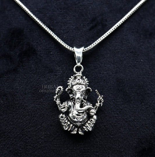 Unisex 925 sterling silver Lord Ganesha pendant with intricate tribal design, handmade jewelry by TRIBAL ORNAMENTS.