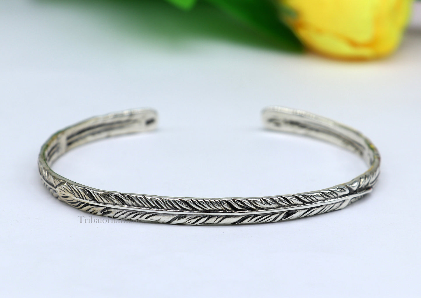 Sterling silver or gold polished feather design adjustable cuff bracelet, unisex handmade jewelry by Tribal Ornaments.