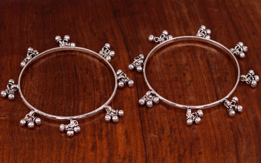 Sterling silver handmade charm bangle bracelet with tribal design, perfect for tribal belly dance jewelry and gifting.