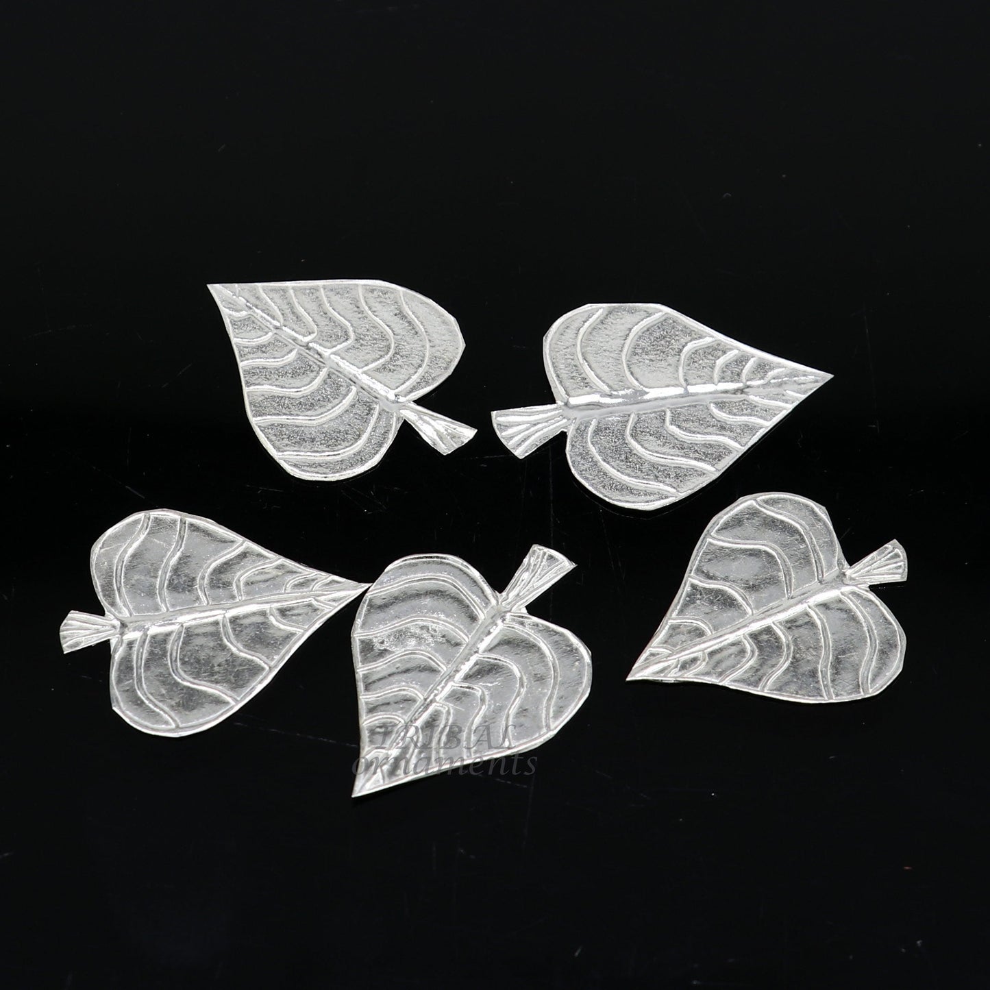 Set of 5 handmade 925 sterling silver pipal leaf puja articles by TribalOrnaments, crafted for spiritual rituals and offerings.