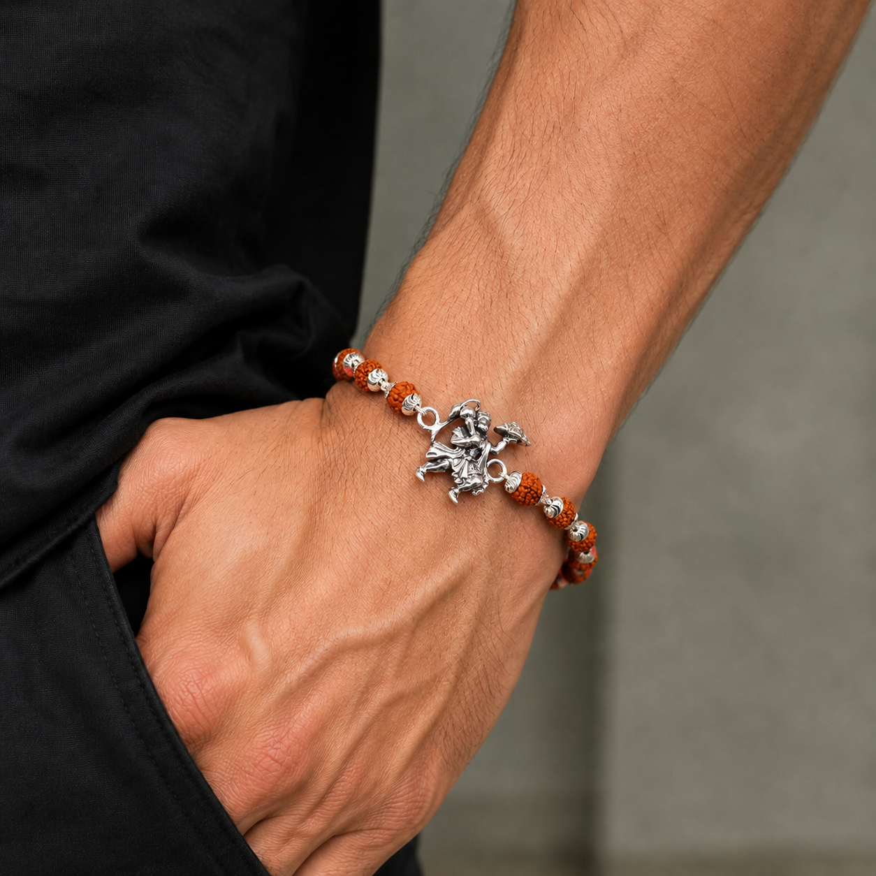 925 sterling silver Flying Hanuman bracelet with Rudraksha and Tulsi beads, featuring intricate silver detailing and traditional design.